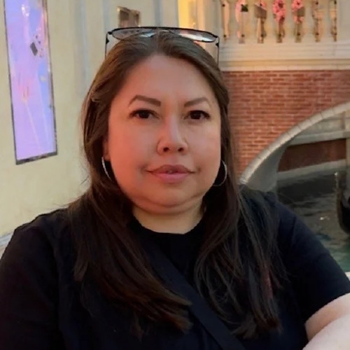 maricela smiling and wearing black shirt